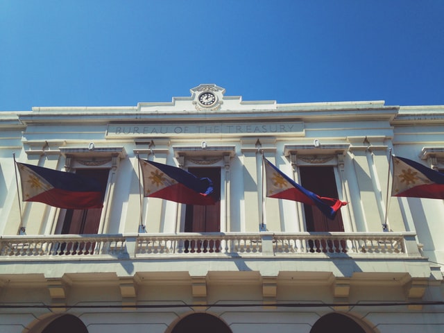 rj-joquico-rMeo_4lBqiM-unsplash Philippine Flags on a Manila street. Photo by RJ Joquico on Unsplash