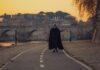 Italy’s Religious Leaders Unite: Historic Interfaith Pact Signed at Ara Pacis A priest walking by the river tiber during the sunset in Roma, Italia