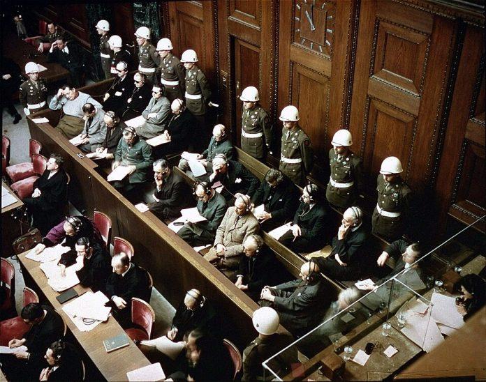 960px-Defendants_in_the_dock_at_nuremberg_trials View of the defendants in the dock at the International Military Tribunal trial of war criminals in Nuremberg, Bavaria, Germany. (Raymond D’Addario - https://collections.ushmm.org/search/catalog/pa7388 - public domain Wikimedia commons)