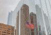 Bank Customer service hangs up on Pope Leo XIV USA flag at Bank of America (Photo by Clémentine CLAUDEL on Unsplash)