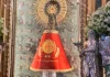 Virgin of Pilar Receives Red Mantle Honoring Persecuted Christians as ACN Spain Marks 60 Years Our Lady of the Pillar wearing the mantle donated by Aid to the Church in Need in Spain. | Credit: ACN Spain.