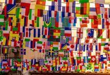 Heavenly Support on the Pitch: Patron Saints Accompany 48 Nations into the 2026 World Cup Flags of Many Nations (Photo by Nick Fewings on Unsplash)