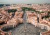 International Association of Exorcists Reaffirms Canon Law After Disputing Claims Made in YouTube Interview Aerial view of St. Peter's Square with the central obelisk and semicircular colonnades in Vatican City, seen from above.