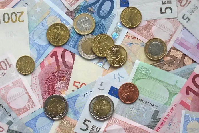 Euro notes and coins. Avij/wikimedia public domain.